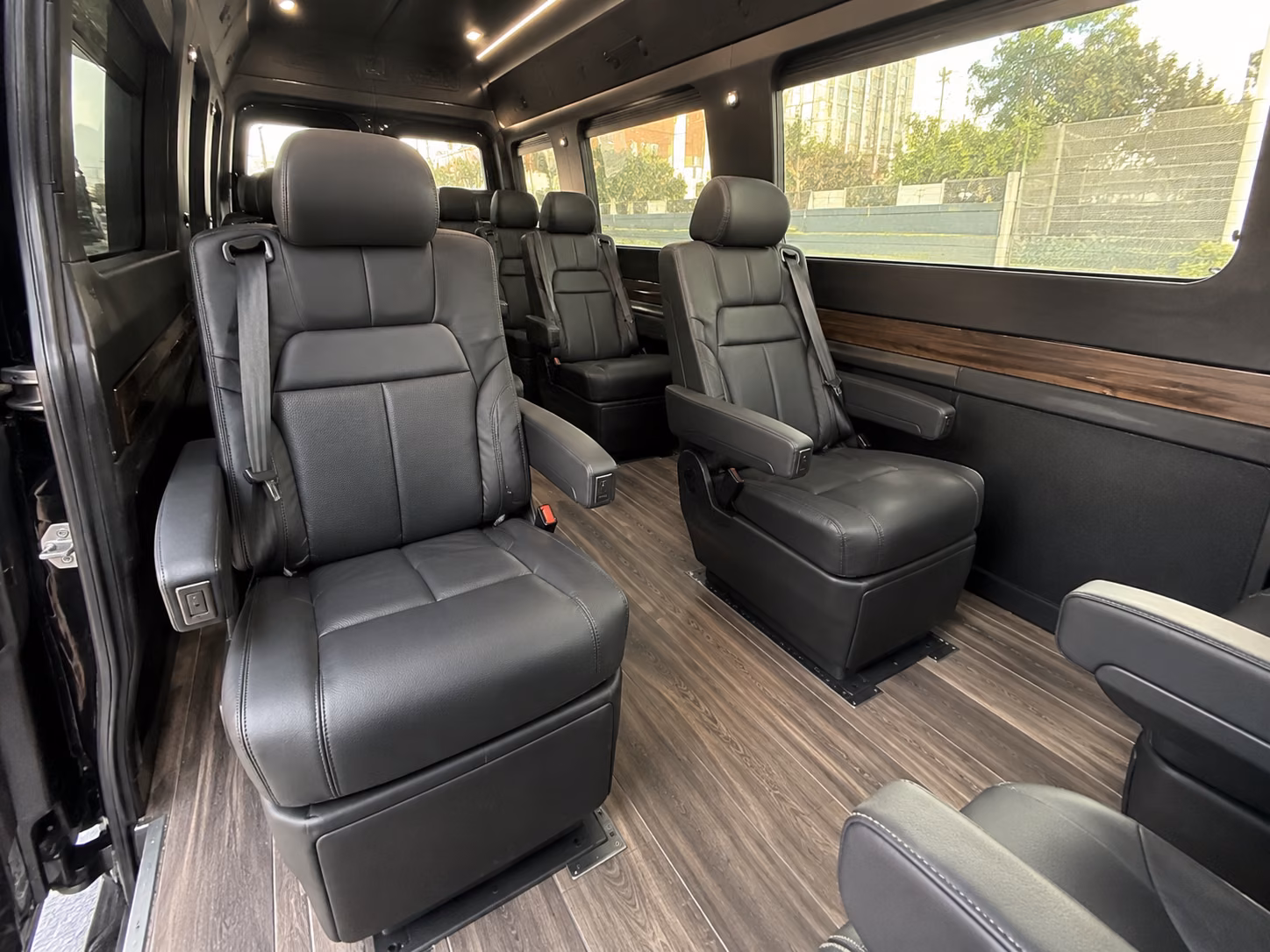 college station sprinter van with driver inside